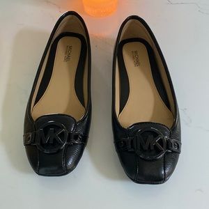 Michael Kors black flats. Wore once inside. Should have bought a smaller size.